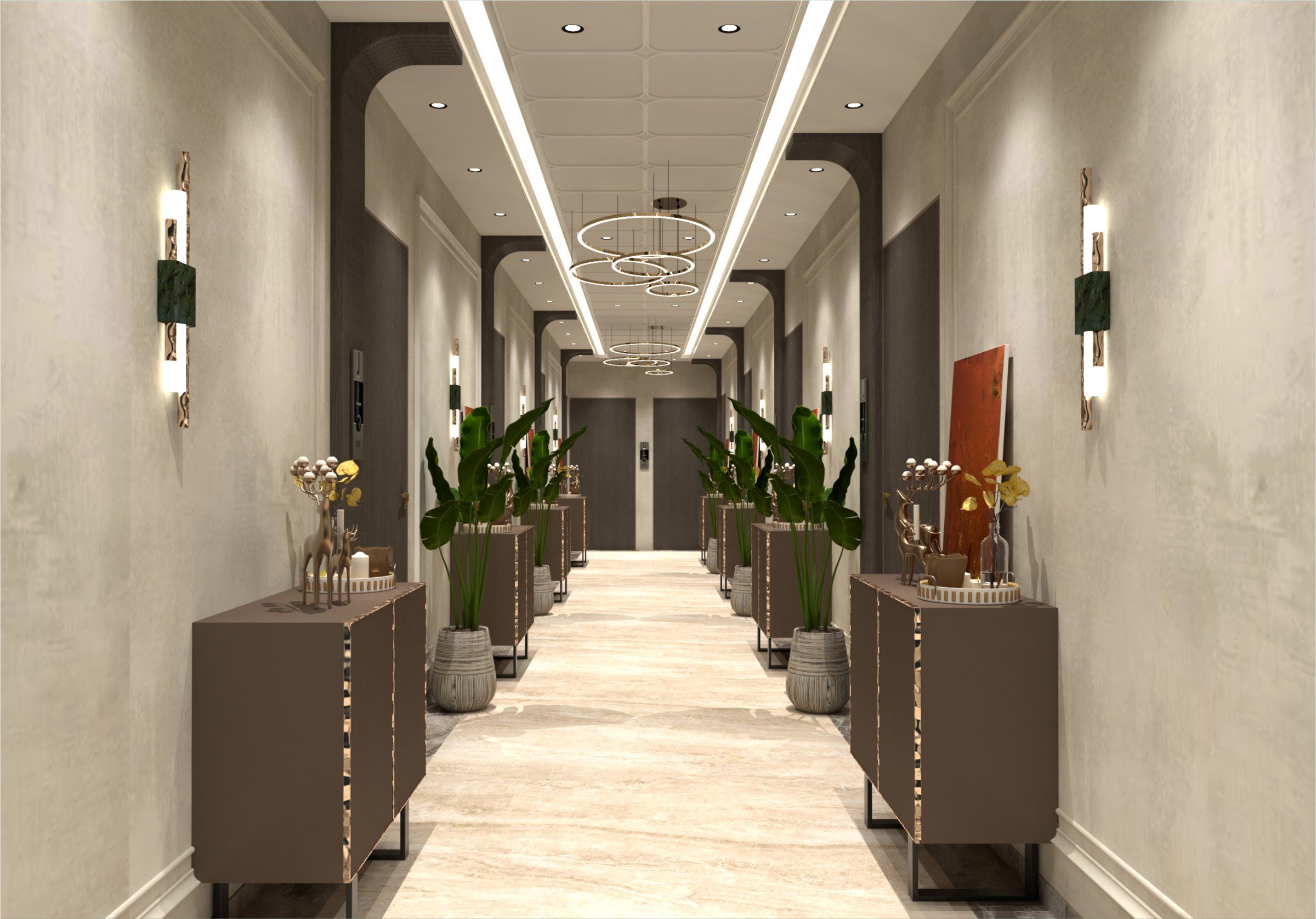 Corridor lobby with warm lighting, planters and marble flooring